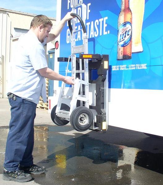 Route driver Alan Obert locks Wyse beverage hand truck.